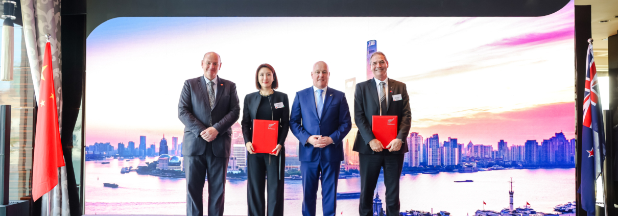 From left NZ Ambassador to China Jonathan Austin Jiaojiao Chen of Grand Farm Prime Minister Christopher Luxon and Willie Wiese